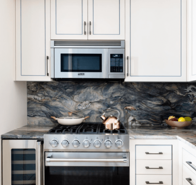 Fusion Granite kitchen with bold swirls and stainless steel accents.