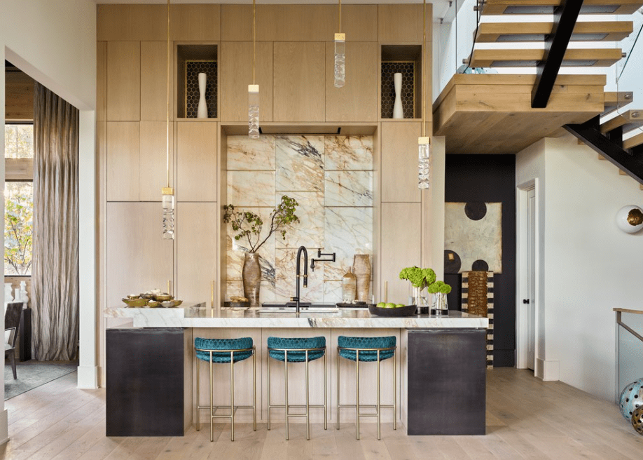 Luxury kitchen with a Calacatta Macchia Vecchia marble island countertop.