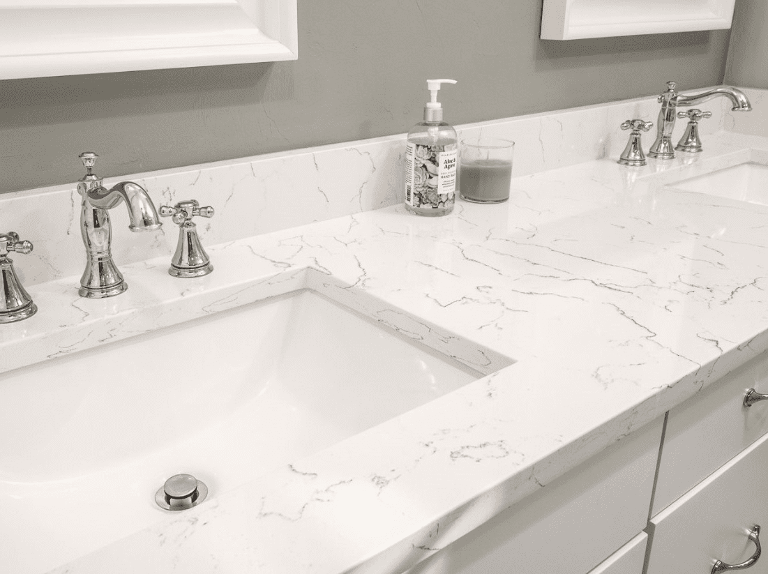 Bianco Venato Vicostone Quartz features soft veins and a bright white background.