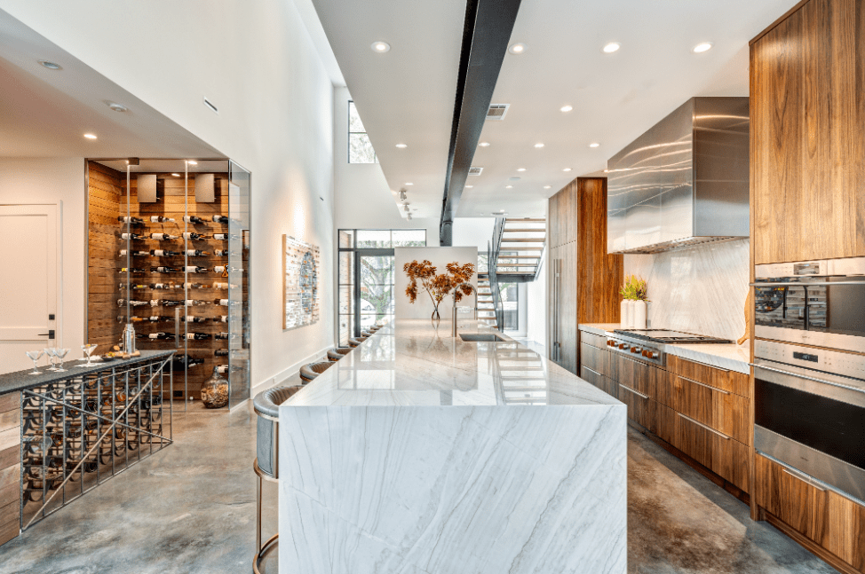 Light gray Lavezzi quartzite island countertop in a contemporary luxury kitchen.