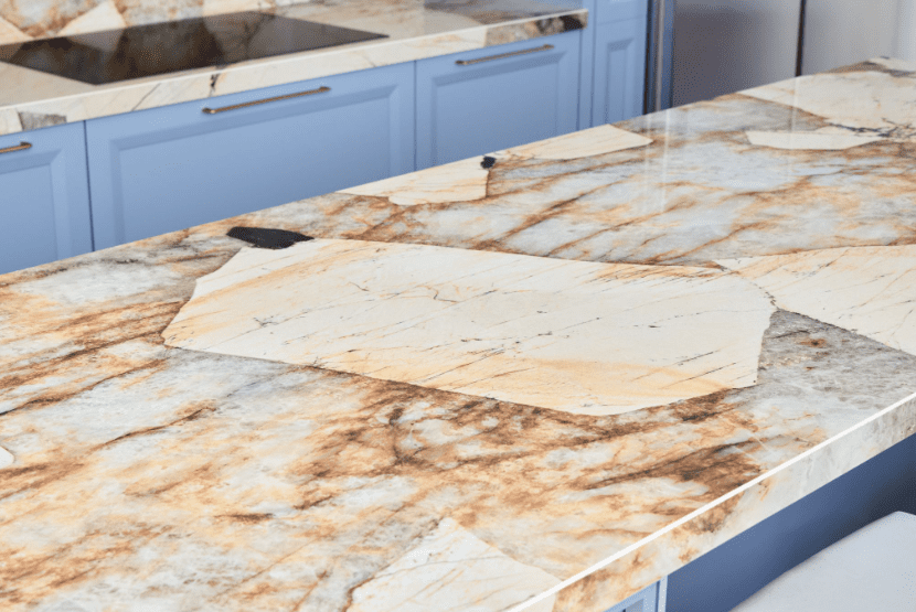 Striking Patagonia granite kitchen countertop with blue countertops.