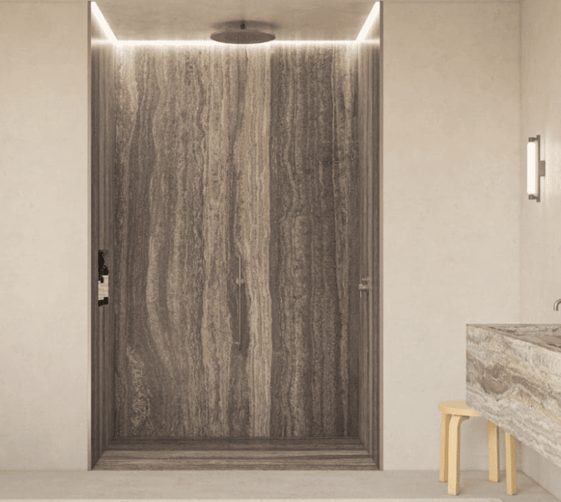 Modern bathroom with travertine shower wall and floating vanityin a light, natural-toned design.