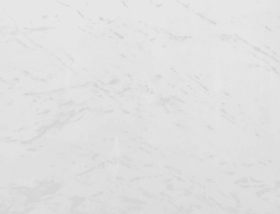 Calacatta Berrini marble surface with subtle gray veining on a white background.