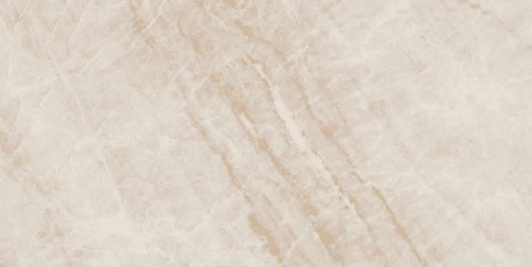 Taj Mahal Quartzite slab with cream and beige tones and soft golden-brown veining.