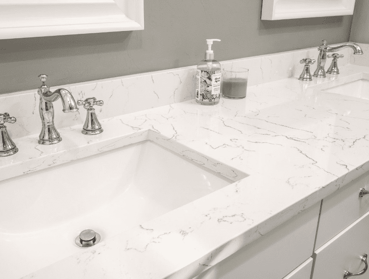 Bianco Venato Vicostone Quartz features soft veins and a bright white background.