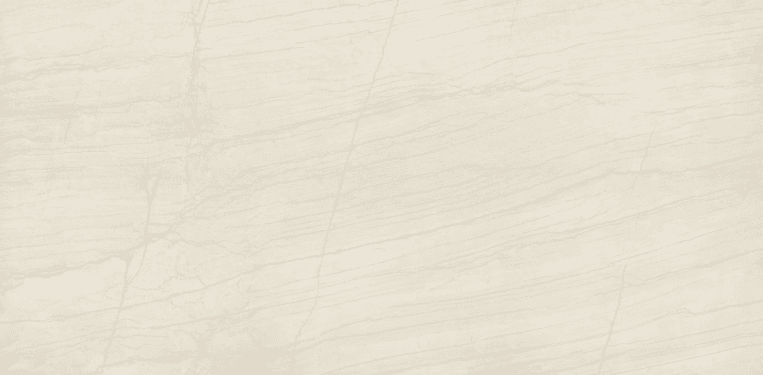 White Macaubas Quartzite slab with a bright white background and delicate gray linear veining.