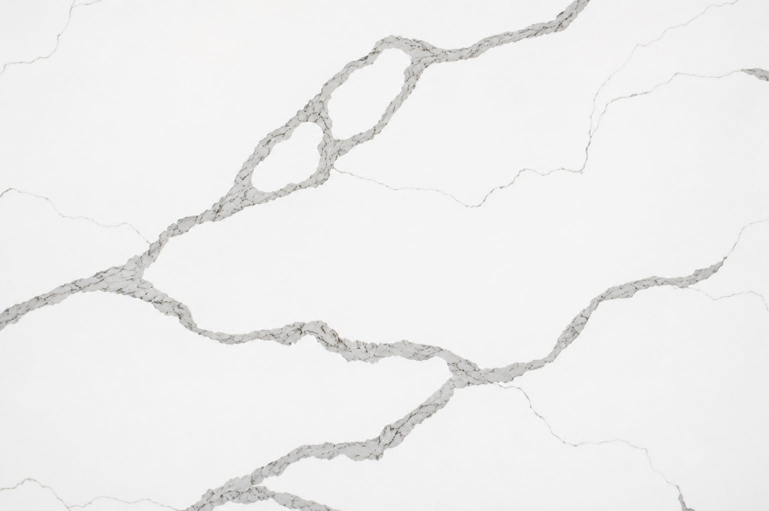 A close up image of Calacatta Classico slab.