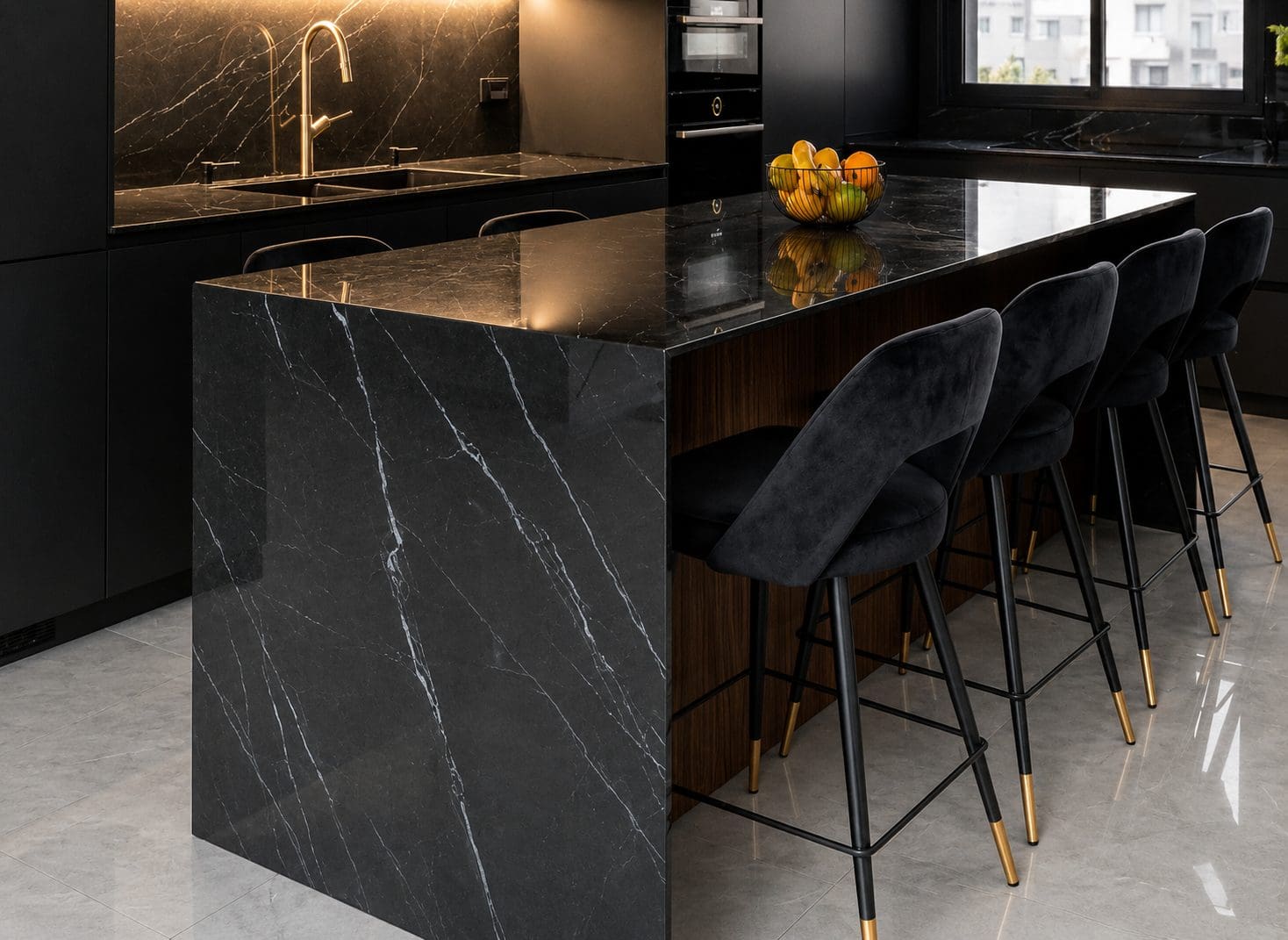 Modern kitchen featuring black porcelain countertops, backsplash, and waterfall island.